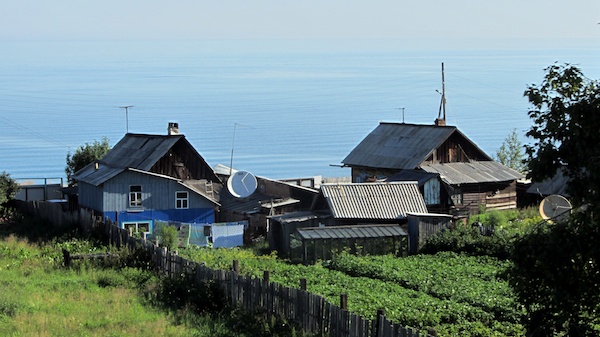 Houses on the shore of Lake Baikal, from the Trans-Siberian Express