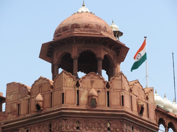 The Indian flag flies above the entrance to Red Fort