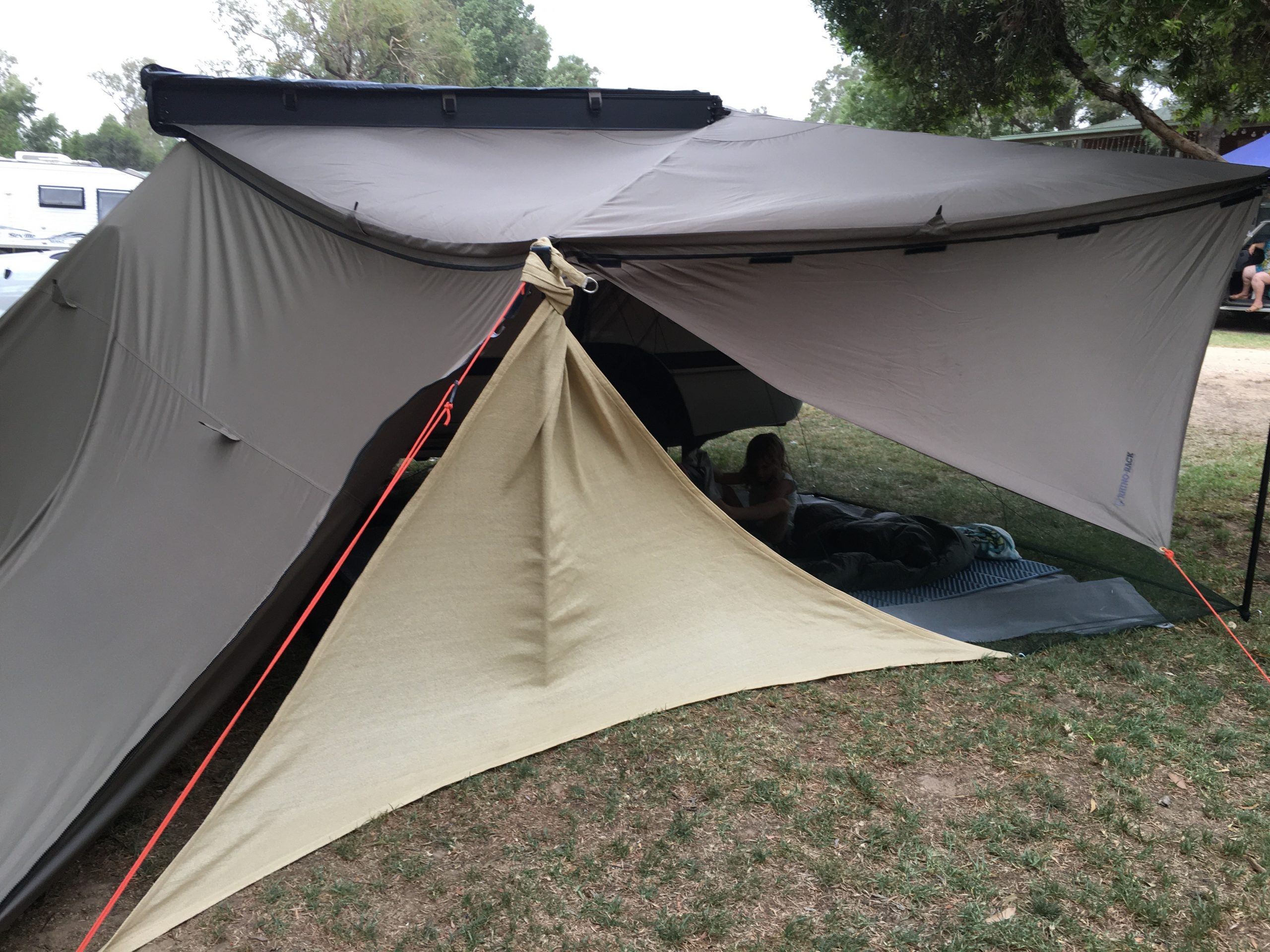 The awning being buffeted by a searing wind from the bush fires