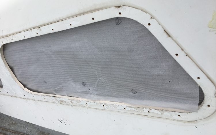 The port window frame, with stubborn sealant