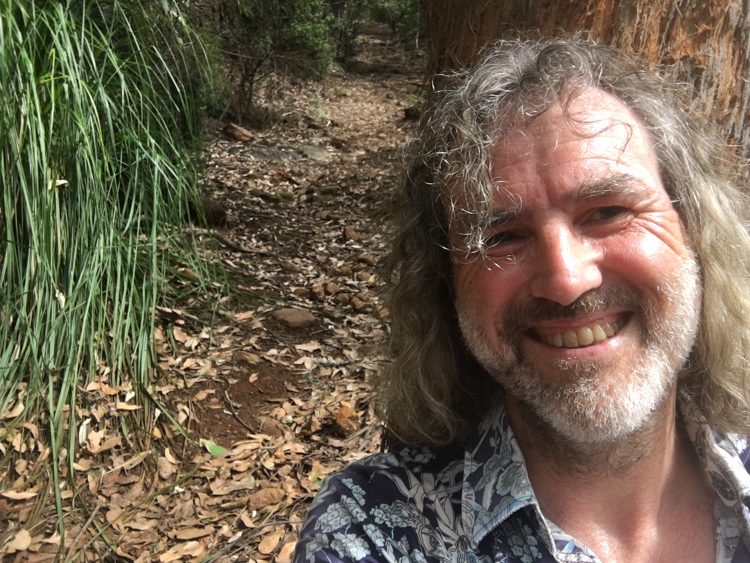 Reinhard resting at a short flat section of the Cathedral Rock track