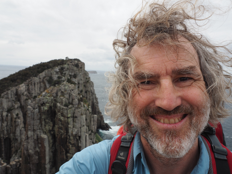 Reinhard in the wind on Cape Hauy