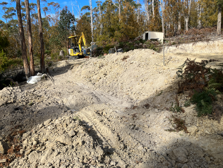 Excavating foundations for some kind of retaining wall