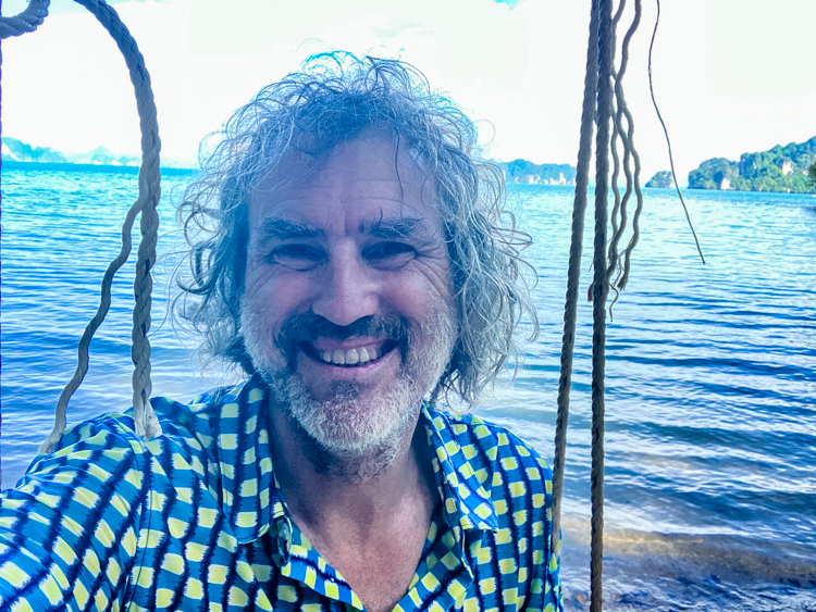 Reinhard on a beach swing on a beach on Ko Yao Noi