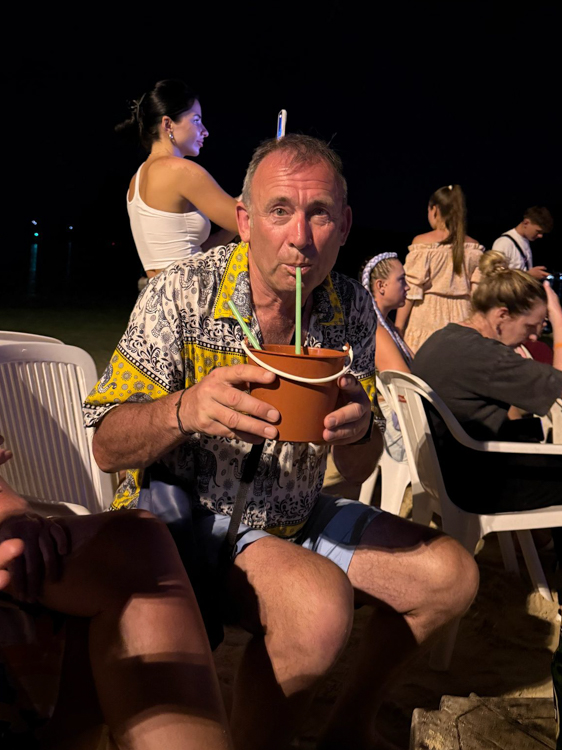 David and a bucket of gin on Phi Phi