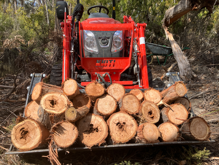 Tractor carrying firewood
