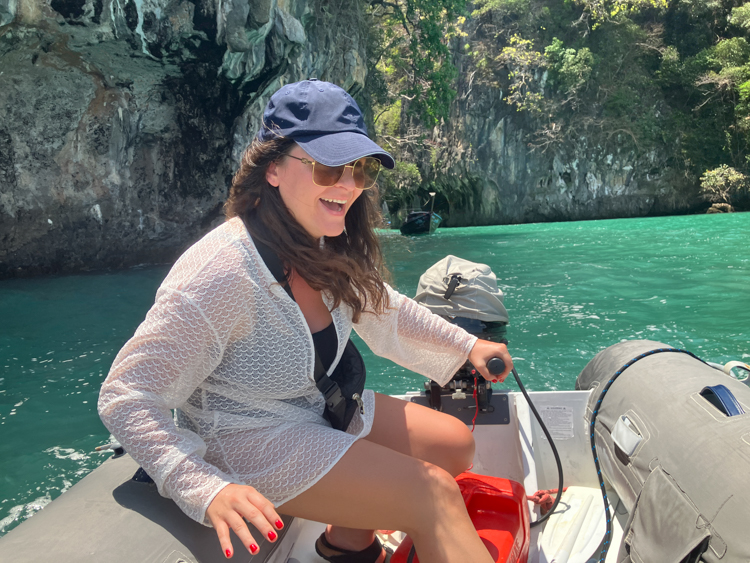 Ivana learning to drive the tender in Hong Lagoon