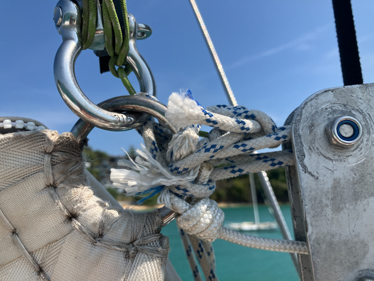Sail repairs at Phi Phi Island