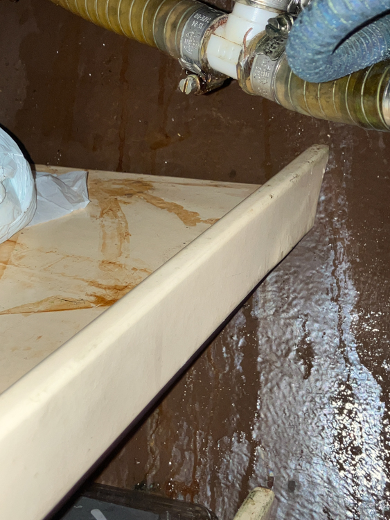 Signs of leakage in the bilge behind the toilet