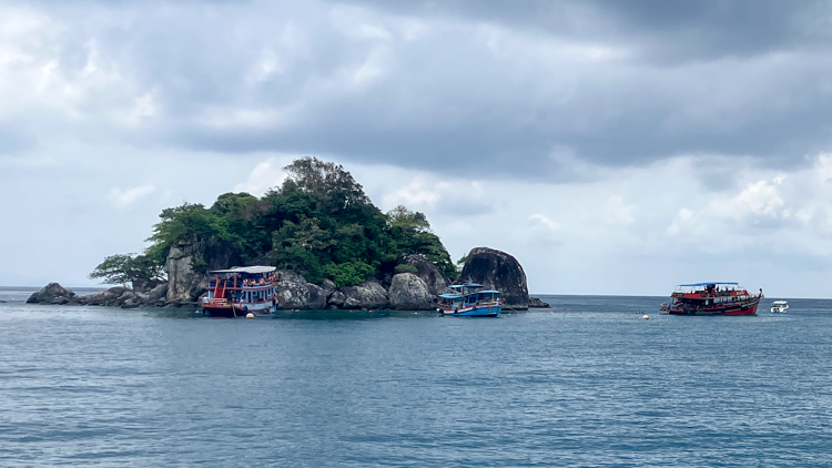 Tourists snorkelling off Ko Rang