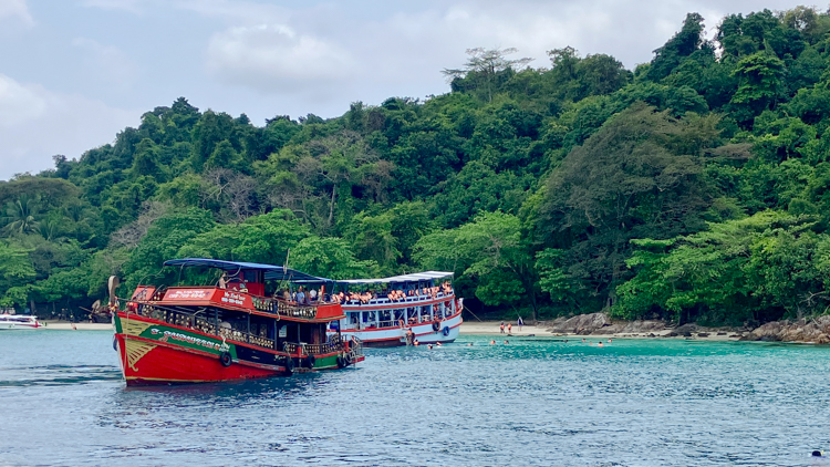 Tourists snorkelling off Ko Rang