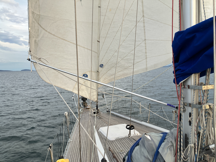A whisker pole on the staysail